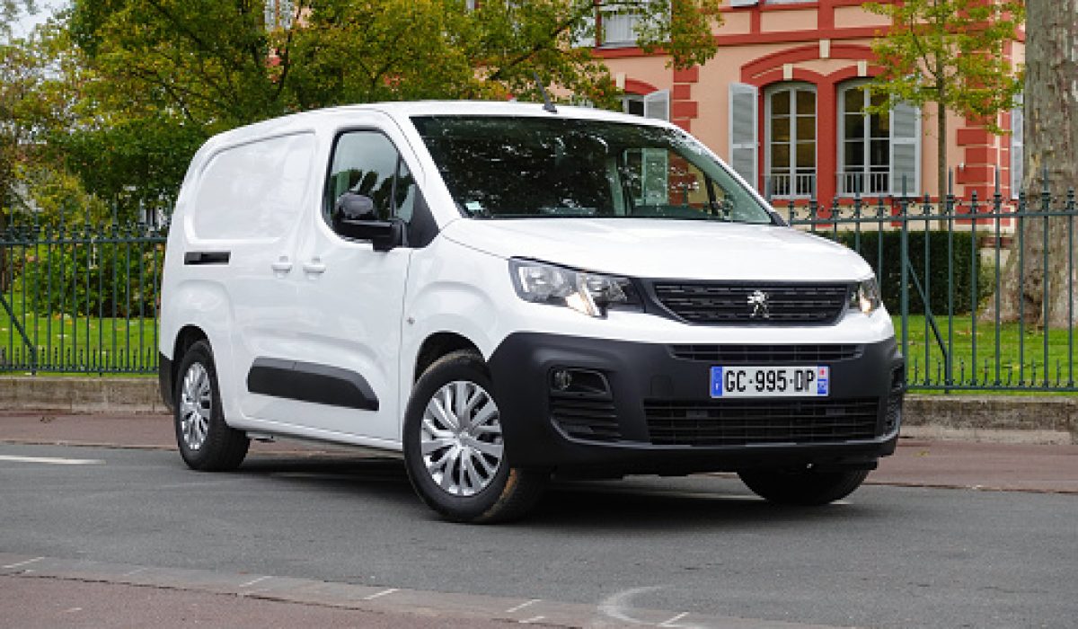 Paris, France - 22 October, 2021: Electric delivery van Peugeot e-Partner on a street. This model is the smallest full electric delivery van from Peugeot brand.